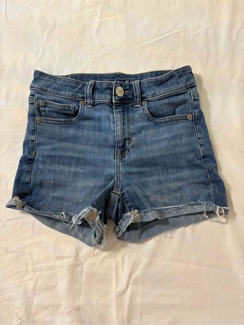American Eagle next level stretch high-rise Shortie jean shorts size 4